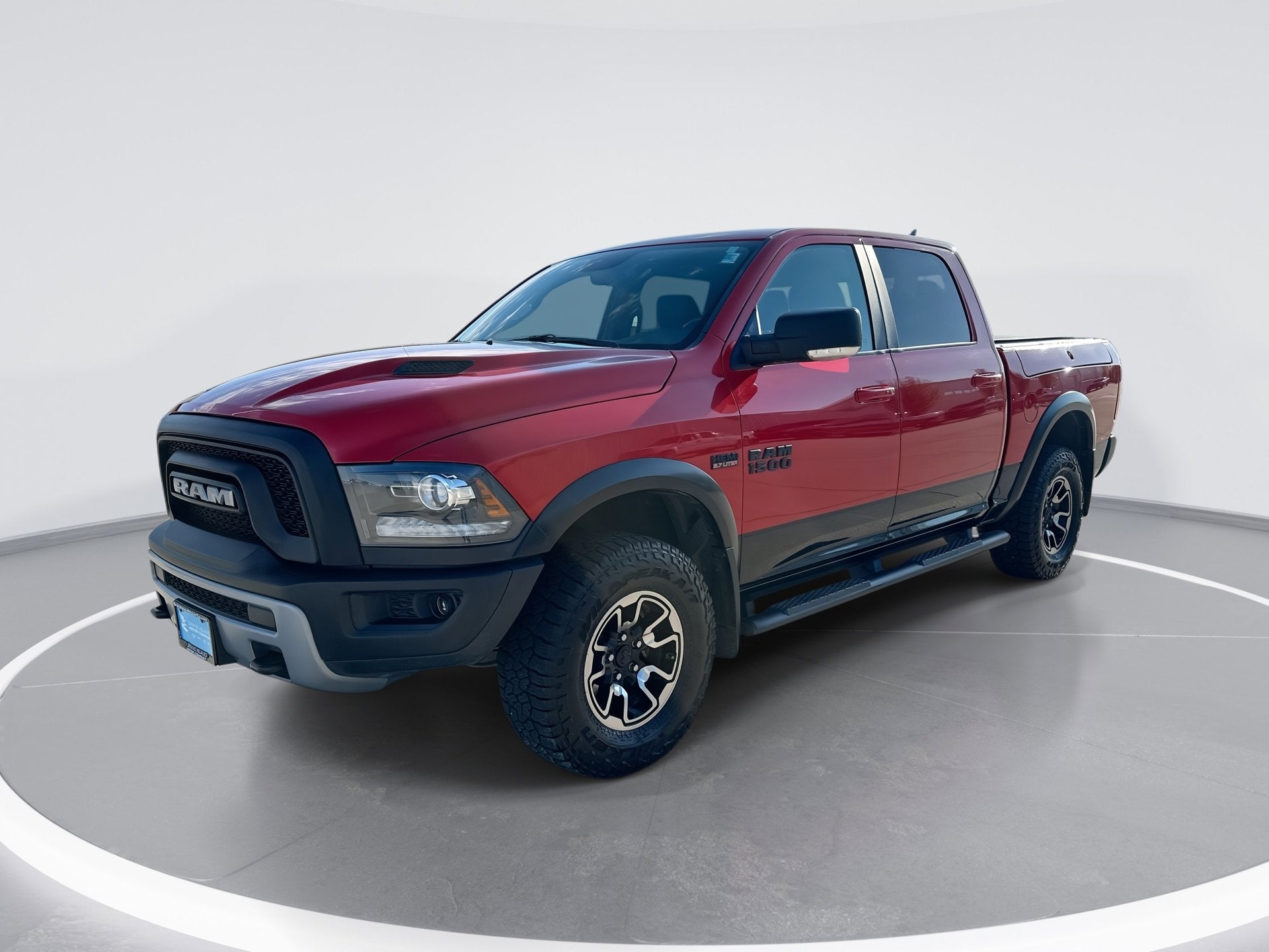 2017 RAM 1500 Rebel in Flame Red Clearcoat — front three-quarter view