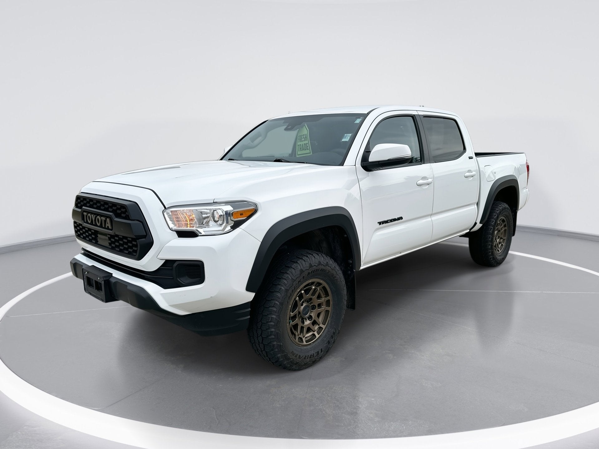 2022 Toyota Tacoma 4WD SR5 in White — front three-quarter view
