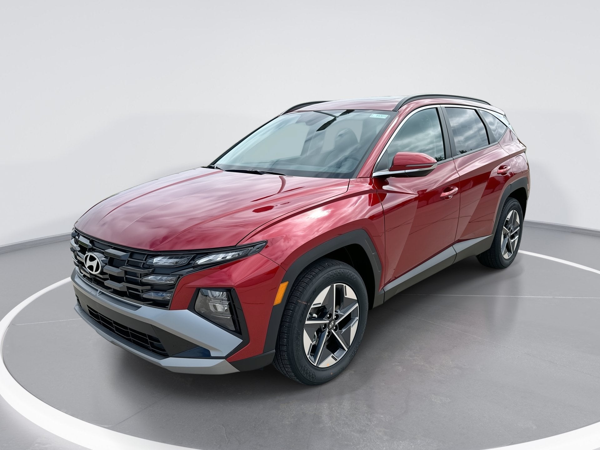 2026 Hyundai TUCSON SEL Premium in Ultimate Red — front three-quarter view