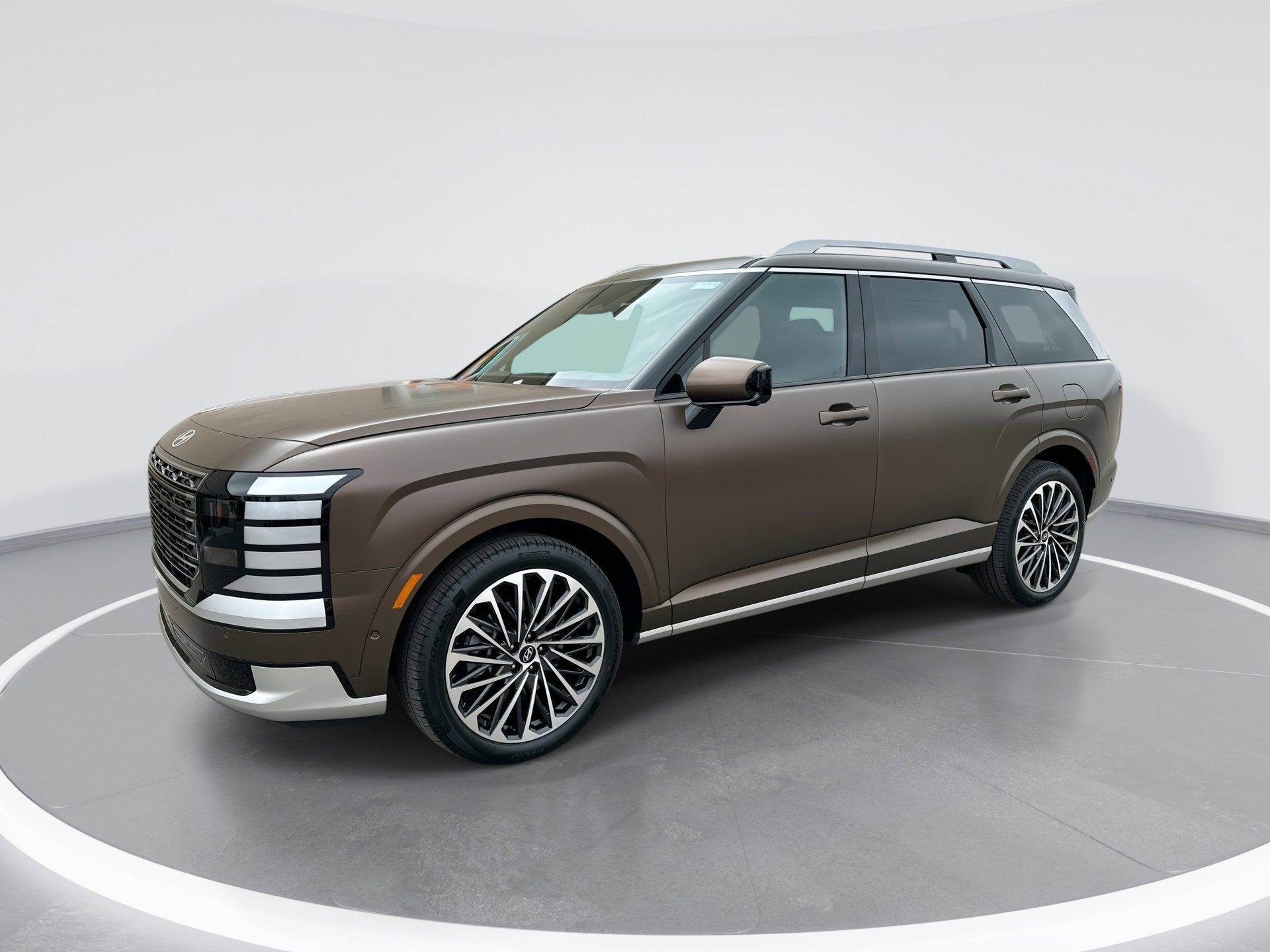 2026 Hyundai PALISADE Calligraphy in Earthy Brass Matte — front three-quarter view